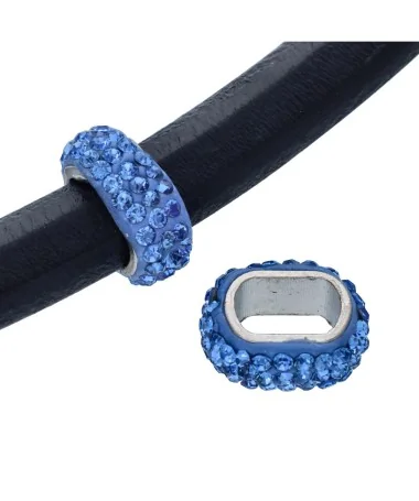 Entrepieza 18x8mm Agujero 11x7mm, Plateada con Cristal Swarovski Light Sapphire Entrepieza 18x8mm Agujero 11x7mm, Plateada con Cristal Swarovski Light Sapphire| Tierra de Abalorios